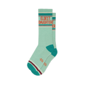Mint green "Eldest Daughter" socks with orange text. Dark teal toes/heels, and striped cuffs in maroon, cream & dark teal.