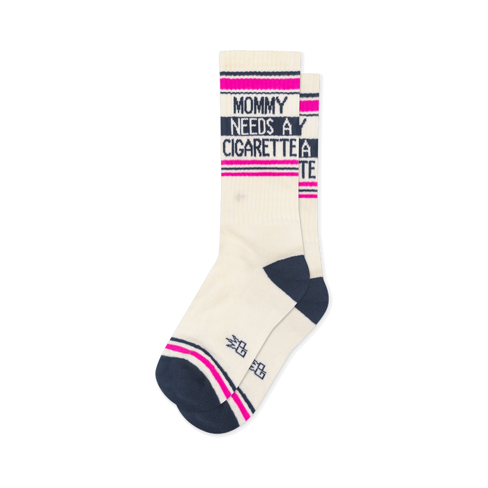 Off-white crew socks with a navy heel and toe, featuring pink and navy stripes and the text Mommy Needs A Cigarette. }}