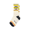 Cream retro socks with black Friend of the Year text, yellow and orange stripes, plus matching black heel and toe caps.