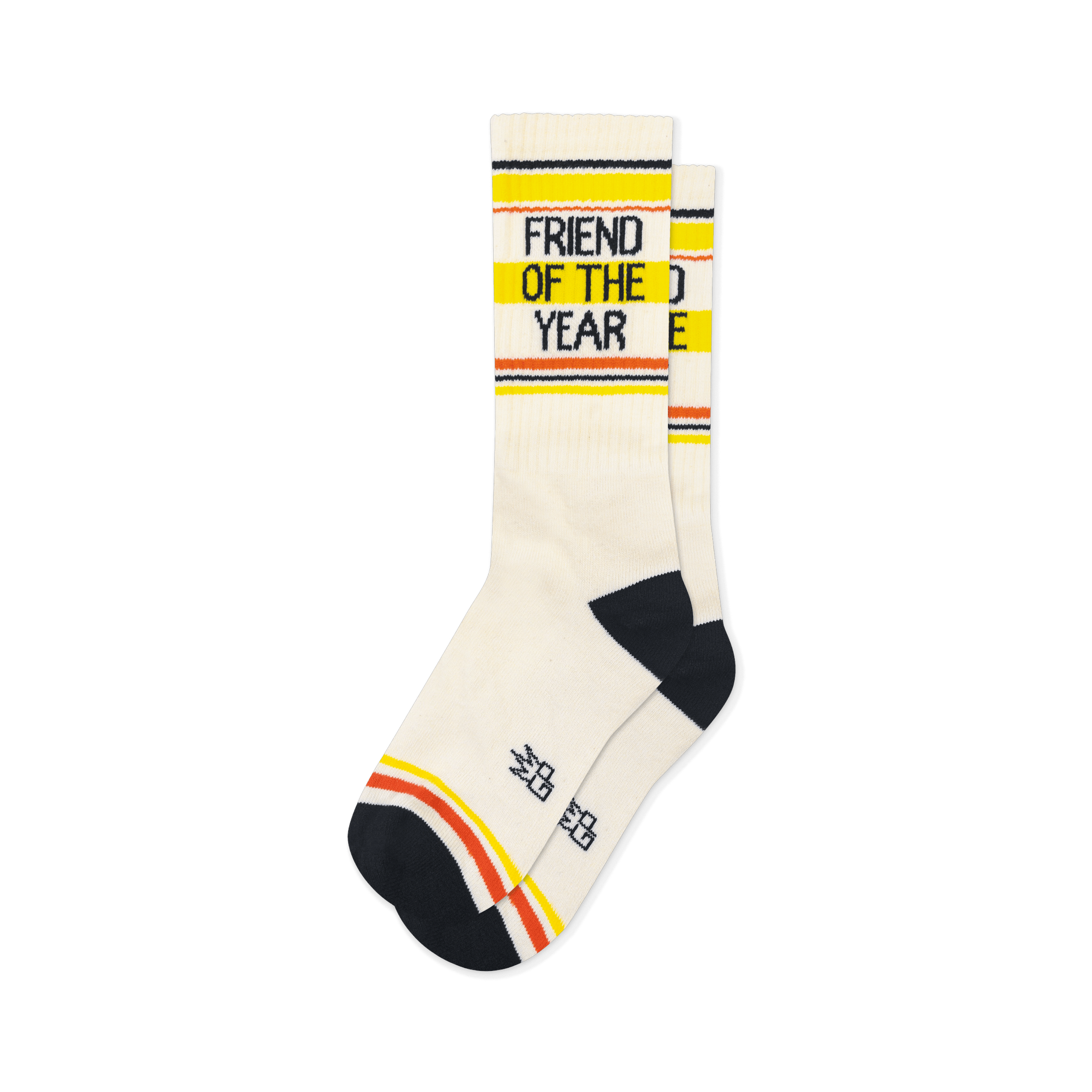 Cream retro socks with black Friend of the Year text, yellow and orange stripes, plus matching black heel and toe caps.