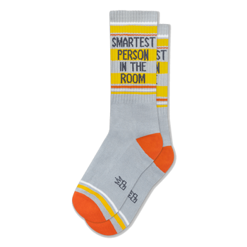 Light grey ribbed socks featuring orange heels, yellow bands, white stripes, and SMARTEST PERSON IN THE ROOM on the calf.