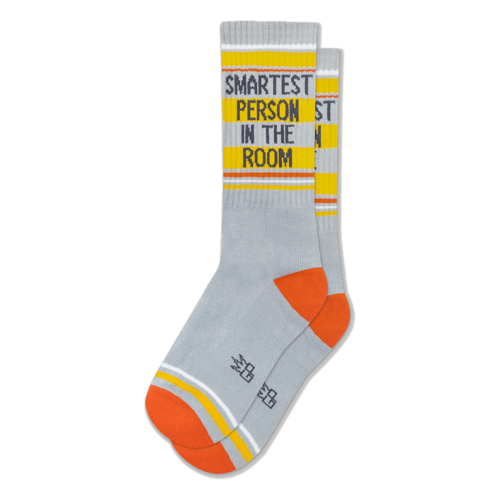 Light grey ribbed socks featuring orange heels, yellow bands, white stripes, and SMARTEST PERSON IN THE ROOM on the calf. }}