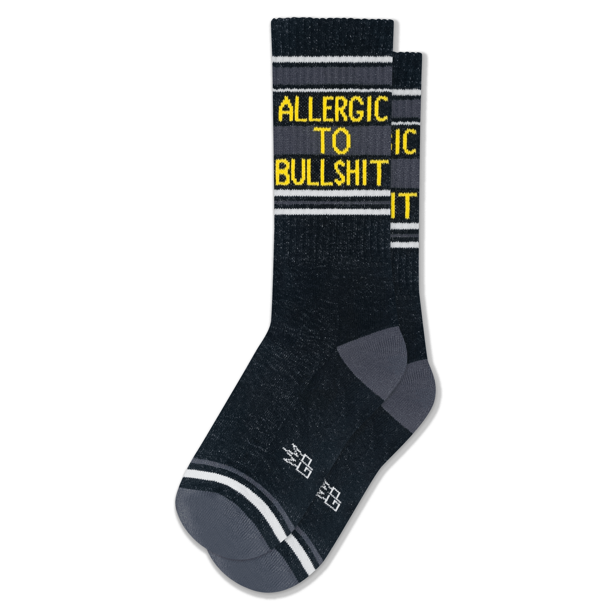 Dark heathered crew socks with grey heels and toes, white stripes, and bright yellow text reading ALLERGIC TO BULLSHIT.