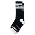 Black crew socks with white stripes at the top and toe, white heels, and the word GROOM in white block letters on the cuff.