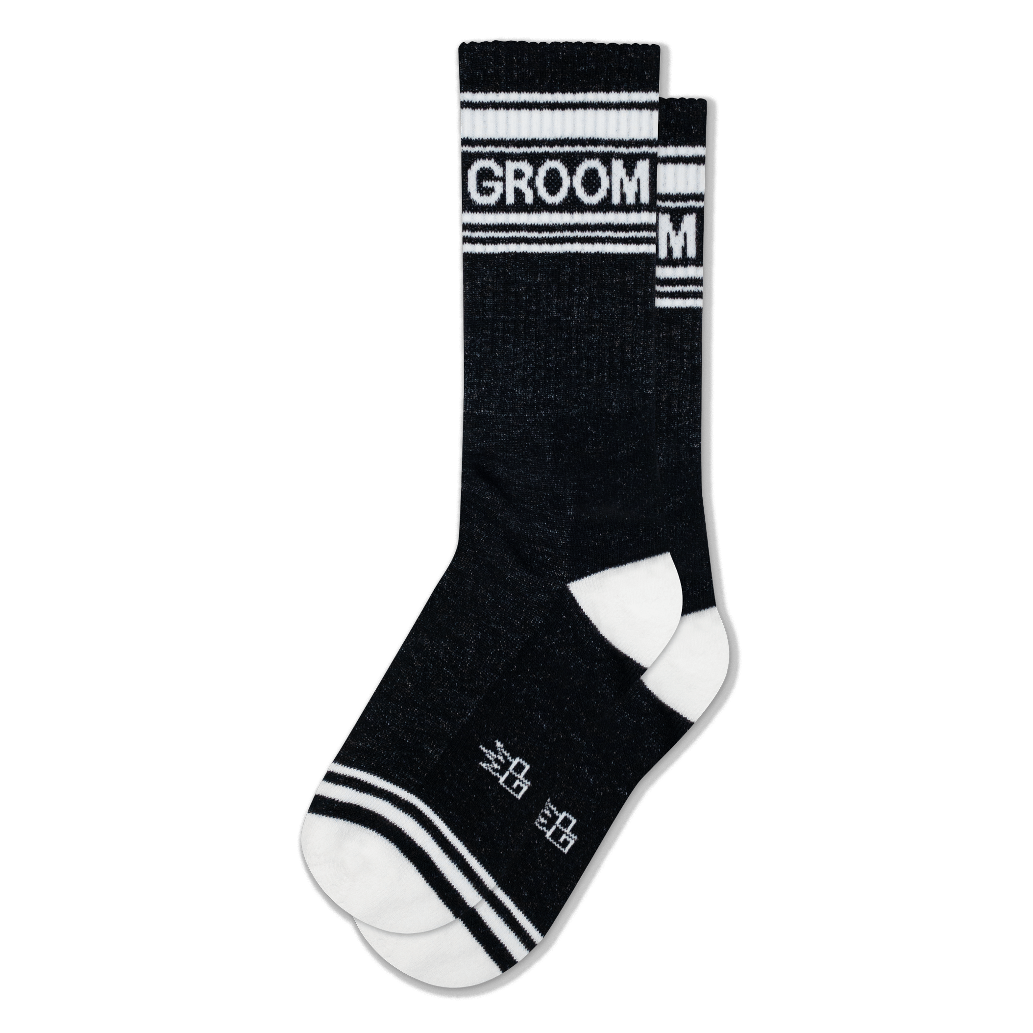 Black crew socks with white stripes at the top and toe, white heels, and the word GROOM in white block letters on the cuff.