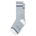 Light grey athletic style crew socks with white heels, white toes, navy stripes, and GROOMSMAN printed around the top cuff.