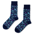 Dark blue crew socks with light blue zodiac symbols like a lion and scales, plus purple stars and crescent moons.