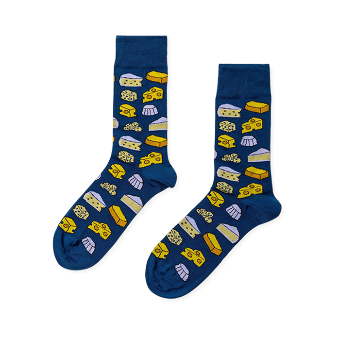 Pair of deep blue crew socks with a repeating pattern of yellow and cream cheese wedges, blocks, and white molds. }}