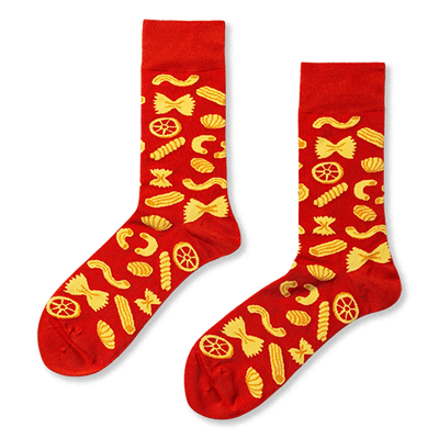 Pair of red crew socks with a repeating yellow pattern of various pasta shapes like farfalle, fusilli, and rotelle.