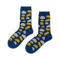 Pair of crew socks with a dark blue base featuring an all-over pattern of various yellow and white cheese shapes.