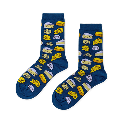 Pair of crew socks with a dark blue base featuring an all-over pattern of various yellow and white cheese shapes.