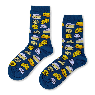 Pair of crew socks with a dark blue base featuring an all-over pattern of various yellow and white cheese shapes.