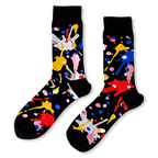 Black crew socks with bright, messy paint splatters in red, blue, yellow, pink, and white.