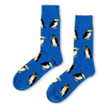 Royal blue crew socks featuring a repeating pattern of puffins with colorful beaks and penguins with yellow neck markings.