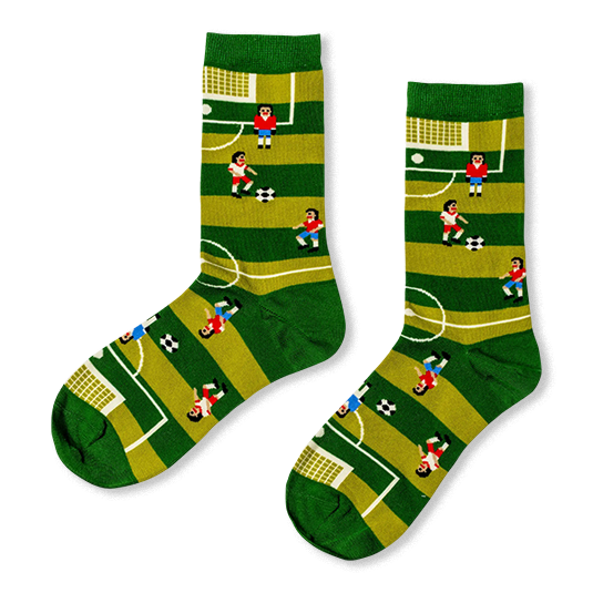 Green crew socks featuring a retro 8-bit video game soccer field with white lines, pixelated players, and goal nets.