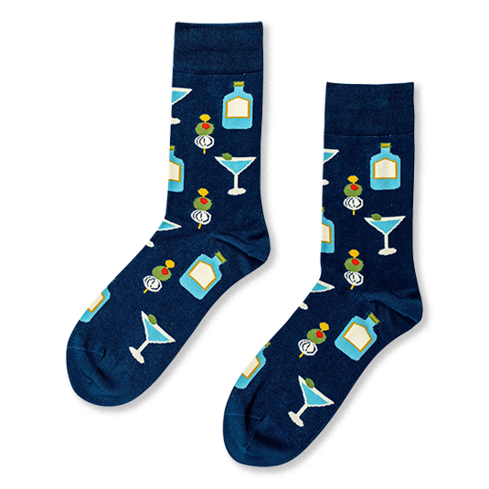 Navy blue crew socks featuring a repeating pattern of light blue martini glasses, liquor bottles, and olive cocktail picks.