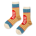 Crew socks featuring blue and white gingham, tan stripes, a red patch reading BREAD, and cream accents.