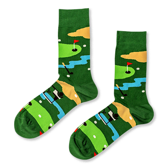 Green crew socks featuring an overhead golf course pattern with putting greens, sand traps, water hazards, and little carts.