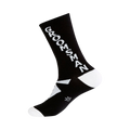 Black crew socks with a white 'Groomsman' vertical graphic and a small tuxedo bow tie image near the ankle.  White accents on the sole.