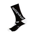 Black crew socks with a white 'Groomsman' vertical graphic and a small tuxedo bow tie image near the ankle.  White accents on the sole.