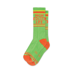 Pair of lime green crew socks with orange stripes and 'High On Life' text, accented with cannabis leaf designs.