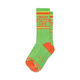 crew, green socks with high on life in orange and white lettering. two orange stripes near top, one at ankle.  
