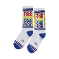 Pair of white crew socks with rainbow 'FUCK YOU' text and smiley faces. Blue and purple stripes at the cuff.