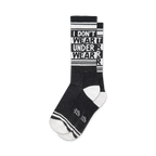 Pair of black crew socks with white stripes and the repeated phrase 'I DON'T WEAR UNDERWEAR'.