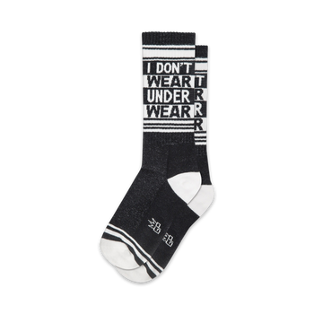 black and white socks that say 'i don't wear t under r wear r' repeated across the foot   