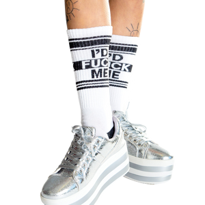 Lifestyle shot: Person wearing white 'I'd Fuck Me' socks, sitting with legs apart.