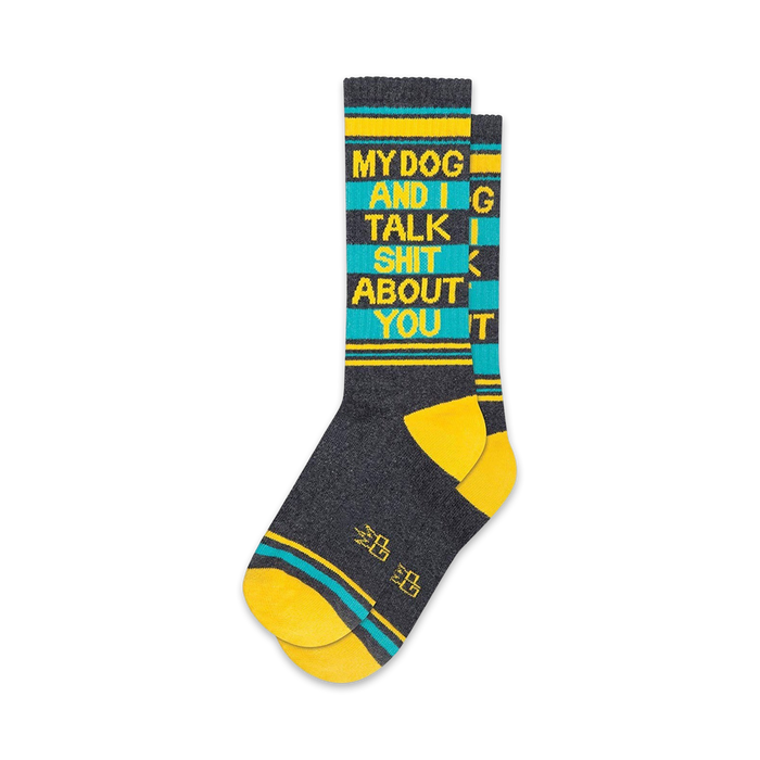 black, gray, teal, and yellow socks with the phrase 