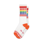 Pair of white crew socks with rainbow 'Brooklyn' text and orange cuffs. 