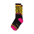 Pair of crew socks in black and hot pink with yellow text reading 'Everything Hurts And I'm Dying'.
