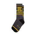 Crew socks in dark gray, black, and yellow.  The socks feature a bold graphic print that says 'I WAS HIRED FOR MY LOOKS'.