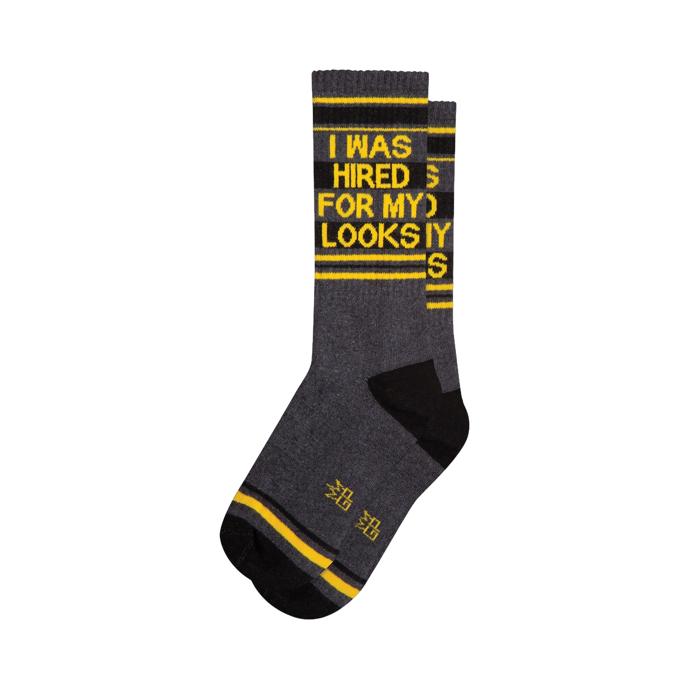Crew socks in dark gray, black, and yellow.  The socks feature a bold graphic print that says 'I WAS HIRED FOR MY LOOKS'.