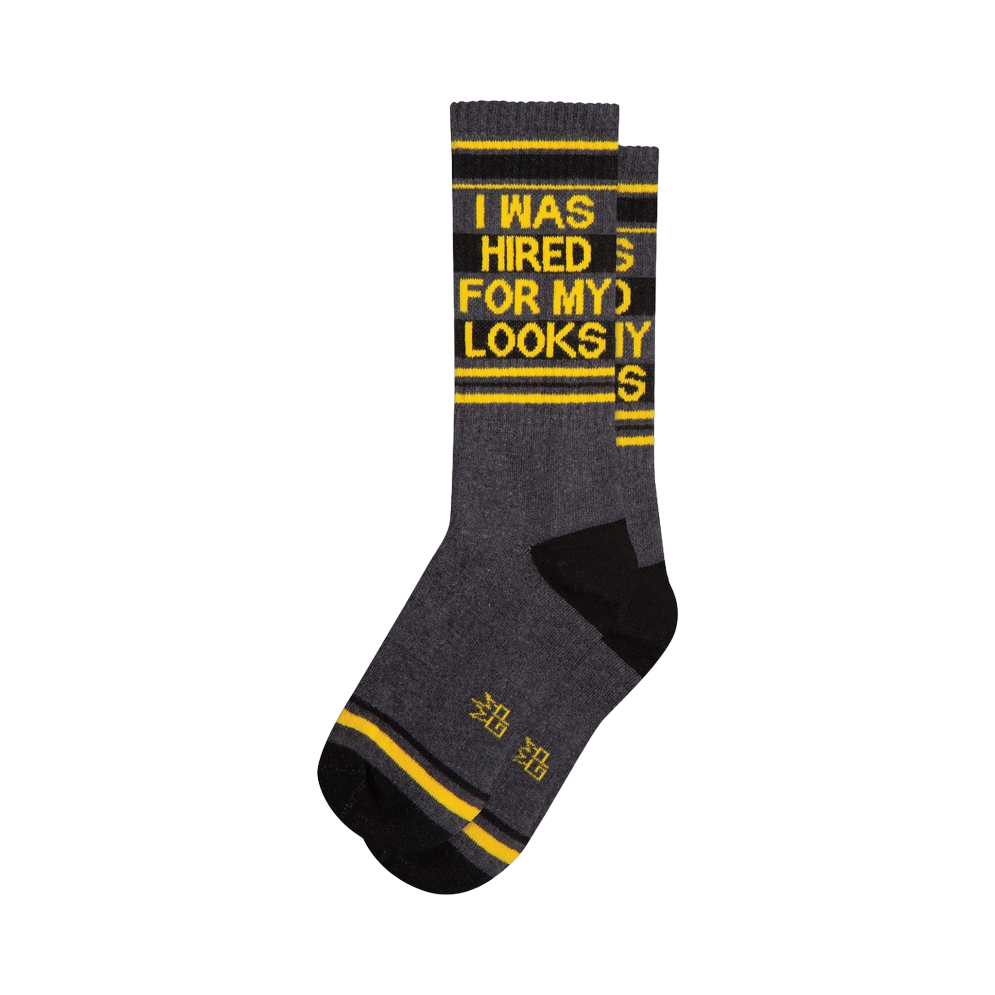 Crew socks in dark gray, black, and yellow.  The socks feature a bold graphic print that says 'I WAS HIRED FOR MY LOOKS'.