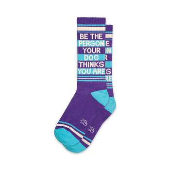 purple crew socks with white and blue slogan "be the person your dog thinks you are" available for men and women.  