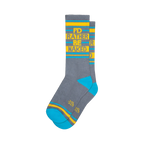 Pair of grey crew socks with teal cuffs and toes.  The socks feature a repeated 'I'd Rather Be Naked' message in yellow text on grey stripes.