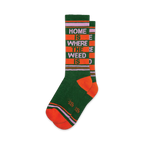 Pair of crew socks in green, orange, and purple.  Features a retro-style stripe pattern and the text 'Home Is Where The Weed Is'.