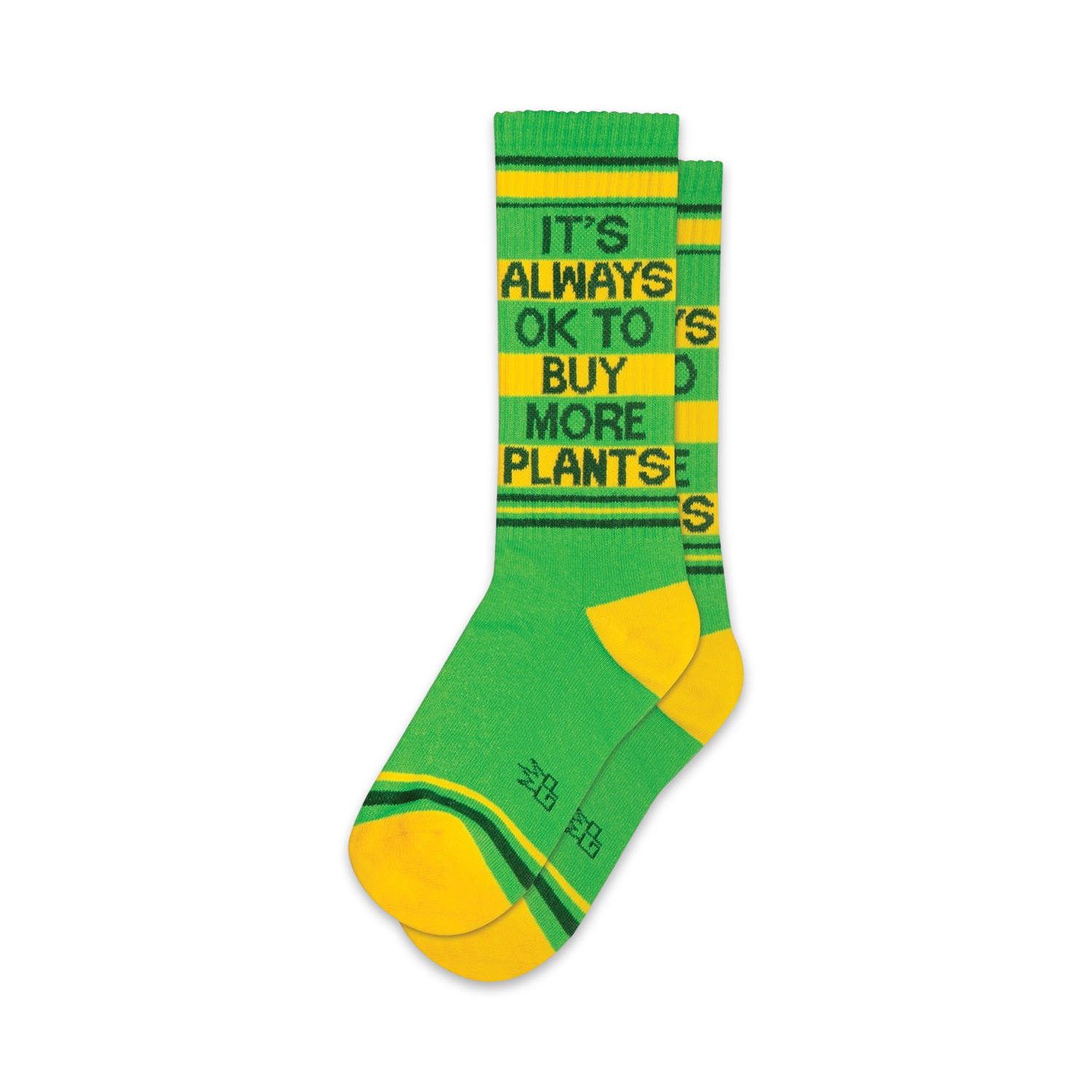 Pair of green and yellow crew socks with the text 'It's Always Ok To Buy More Plants' in black.  Features yellow and green stripes at the cuff.