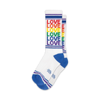 Pair of white crew socks with rainbow or brown 'LOVE' vertical stripes and blue/brown cuffs.