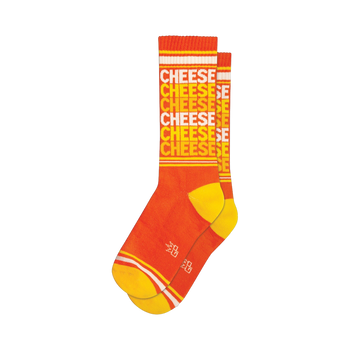 Pair of orange crew socks with a repeating 'CHEESE' pattern in a lighter orange and white. Yellow stripes are visible at the top and bottom cuffs.