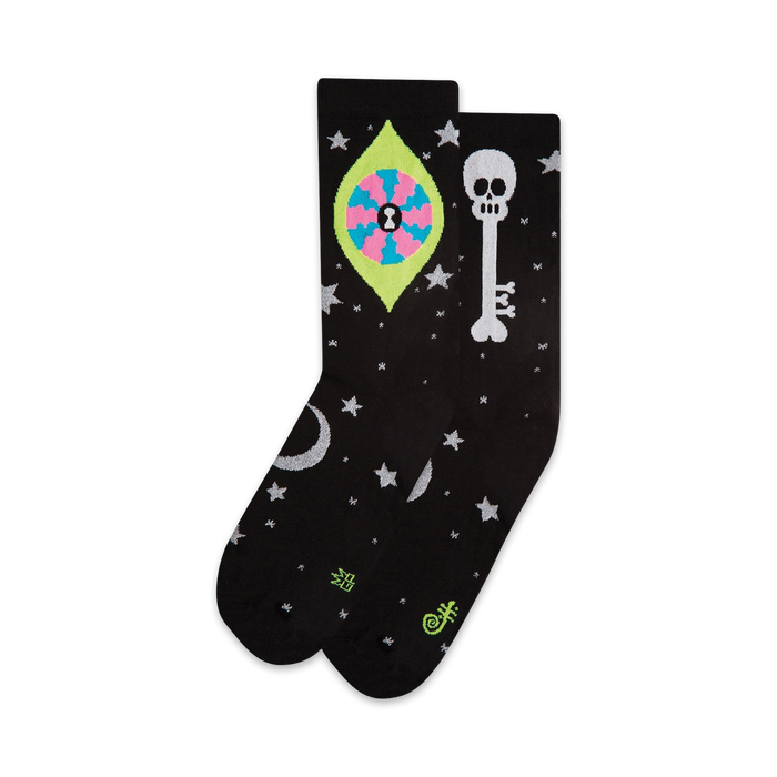 black crew socks with white stars, eyeball, skull, and moon. for men and women.  