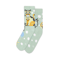 Pair of pastel green crew socks with a whimsical illustrated cat and cloud design. Yellow, orange, and white details.