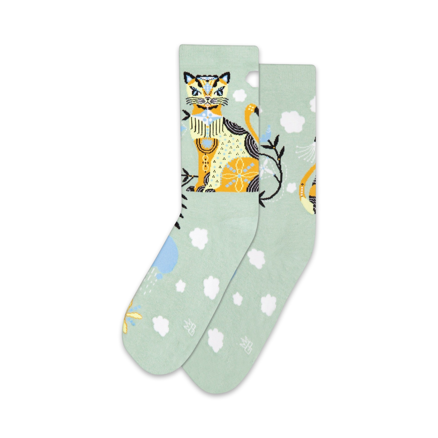 Pair of pastel green crew socks with a whimsical illustrated cat and cloud design. Yellow, orange, and white details.