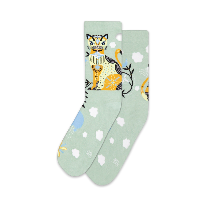 unisex mint green crew socks with orange cats & white clouds.   