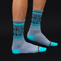 Flat lay product shot of the socks on a black background. [lf]