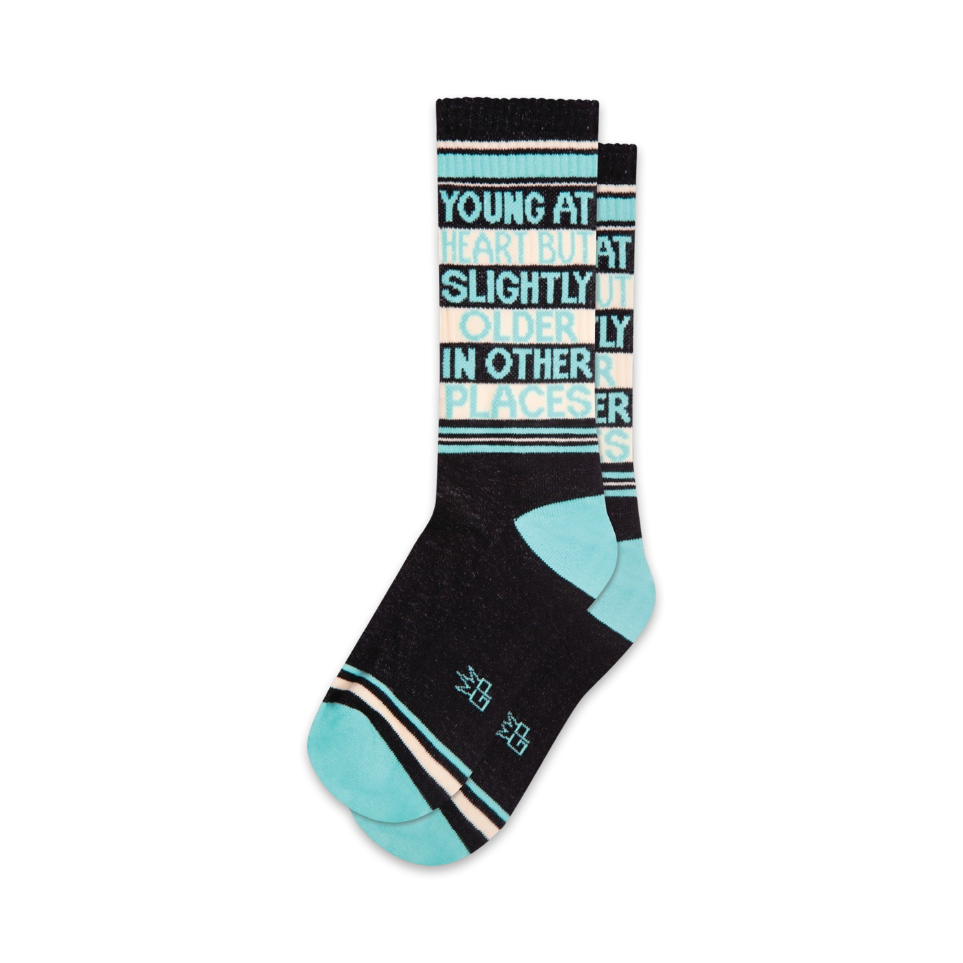 Pair of crew socks in black, teal, and off-white. Features a vertical text design reading 'Young at heart but slightly older in other places'.