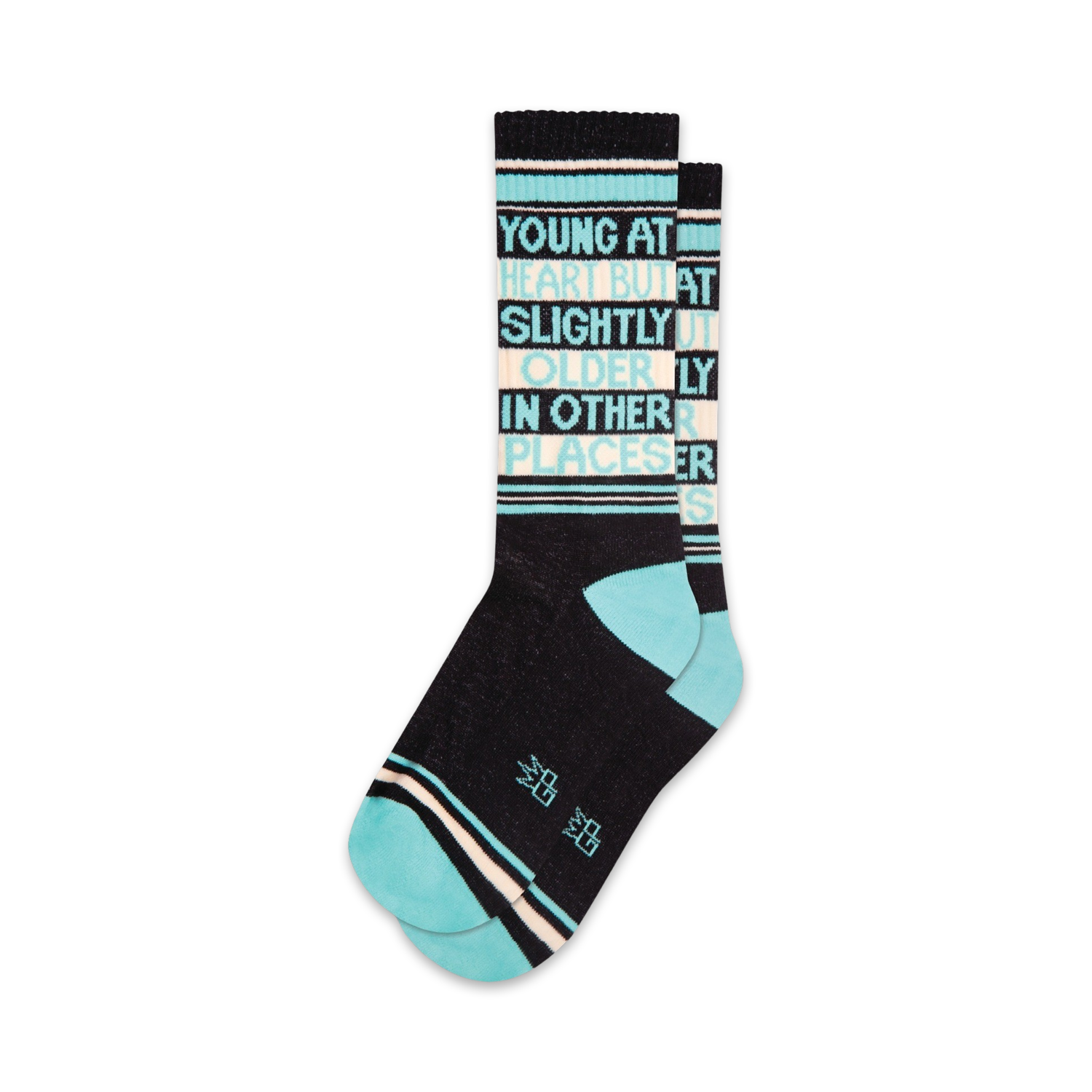 Pair of crew socks in black, teal, and off-white. Features a vertical text design reading 'Young at heart but slightly older in other places'.