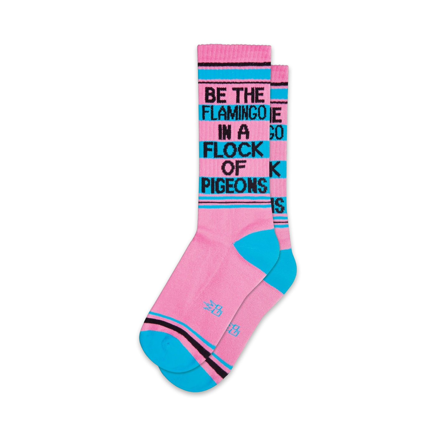 Pair of pink crew socks with teal accents and the phrase 'Be the flamingo in a flock of pigeons' in black.